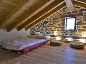 Posteľ alebo postele v izbe v ubytovaní Holiday Home Rustico Olmo by Interhome