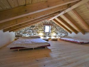 Posteľ alebo postele v izbe v ubytovaní Holiday Home Rustico Olmo by Interhome