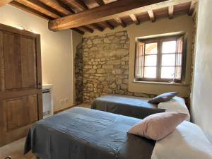 Posteľ alebo postele v izbe v ubytovaní Apartment Saxum by Interhome