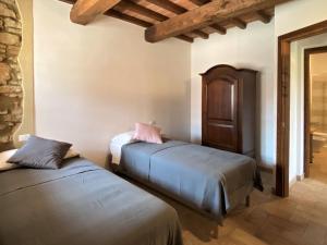 Posteľ alebo postele v izbe v ubytovaní Apartment Saxum by Interhome