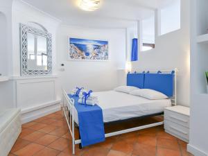 Posteľ alebo postele v izbe v ubytovaní Holiday Home Relais Cacace by Interhome