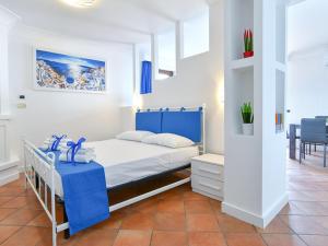 Posteľ alebo postele v izbe v ubytovaní Holiday Home Relais Cacace by Interhome