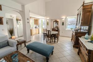 A seating area at Seafront House in Andros Town by Explore Andros