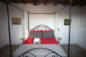 Postel nebo postele na pokoji v ubytování Kato Koufonisi Stone House
