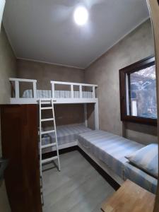 A bed or beds in a room at Villa Michela