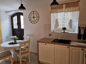 Kuchyň nebo kuchyňský kout v ubytování Apartman Ivano Cres