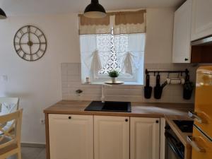 Kuchyň nebo kuchyňský kout v ubytování Apartman Ivano Cres
