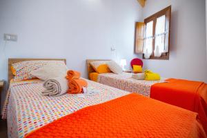 Postel nebo postele na pokoji v ubytování Holiday Room Sa Tebia
