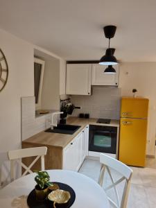 Kuchyň nebo kuchyňský kout v ubytování Apartman Ivano Cres