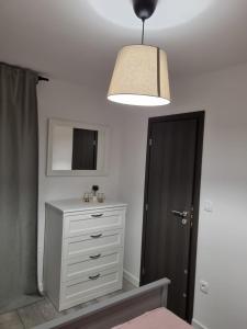 TV a/nebo společenská místnost v ubytování Apartman Ivano Cres