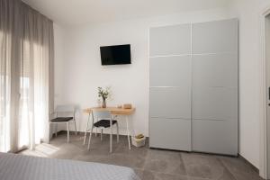 TV a/nebo společenská místnost v ubytování Nerissa suites&rooms