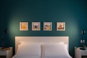 Posteľ alebo postele v izbe v ubytovaní Nerissa suites&rooms