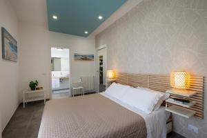 Posteľ alebo postele v izbe v ubytovaní Nerissa suites&rooms