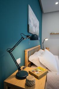 Posteľ alebo postele v izbe v ubytovaní Nerissa suites&rooms