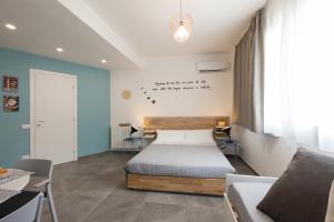 Posteľ alebo postele v izbe v ubytovaní Nerissa suites&rooms