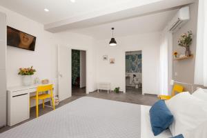 Posteľ alebo postele v izbe v ubytovaní Nerissa suites&rooms