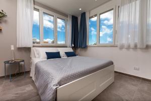 Posteľ alebo postele v izbe v ubytovaní Nerissa suites&rooms