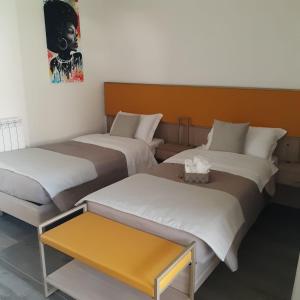Postel nebo postele na pokoji v ubytování Rainbow Sweet Rooms