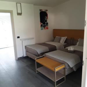 Postel nebo postele na pokoji v ubytování Rainbow Sweet Rooms