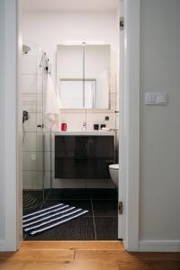 Ванна кімната в Apartament 15