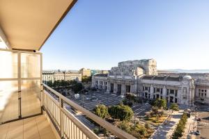 a balcony with a view of a city at HD8 Hotel Milano in Milan