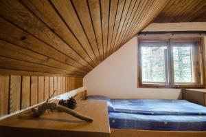 Letto o letti in una camera di Rustic Home Tara