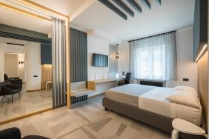 A bed or beds in a room at Leukosìa Holiday House