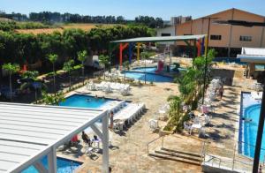 an overhead view of a swimming pool in a resort at Fiori Caldas Novas - 245 in Caldas Novas