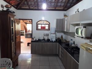 Una cocina o kitchenette en Hostel Mantiqueira