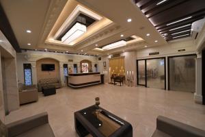 a large lobby with a waiting room and a salon at Hotel Grand Safari in Jaipur