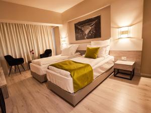 Un pat sau paturi într-o cameră la Hotel Posada
