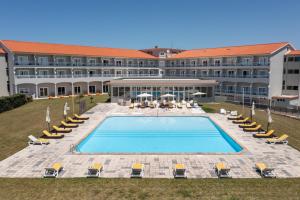 an aerial view of a hotel with a swimming pool at Star inn Peniche in Peniche