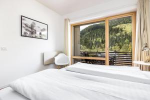 Letto o letti in una camera di Quercus Appartements contactless check-in