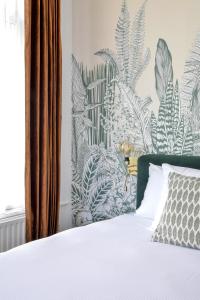 Voodi või voodid majutusasutuse Hotel Sebel toas