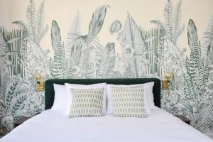 Voodi või voodid majutusasutuse Hotel Sebel toas