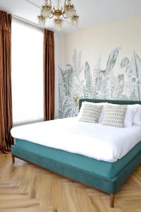 Voodi või voodid majutusasutuse Hotel Sebel toas