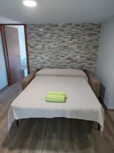 A bed or beds in a room at Mirador Puerto