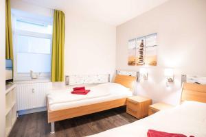 Ένα ή περισσότερα κρεβάτια σε δωμάτιο στο Villa Marin Wohnung 04 +26 φωτογραφίες