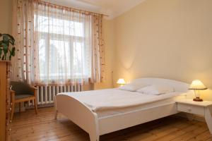 Postel nebo postele na pokoji v ubytování Guesthouse Jakob Lenz