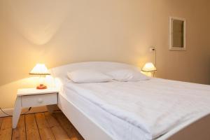 Postel nebo postele na pokoji v ubytování Guesthouse Jakob Lenz