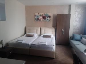 Postel nebo postele na pokoji v ubytování Hotel Usce