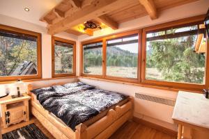Posteľ alebo postele v izbe v ubytovaní Willa Przy Dolinie Kościeliskiej - Prywatne Jacuzzi & Sauna