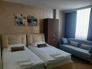 Postel nebo postele na pokoji v ubytování Hotel Usce
