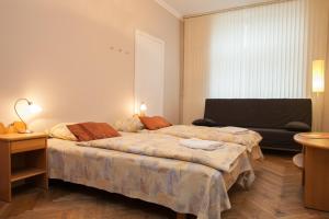 Postel nebo postele na pokoji v ubytování Guesthouse Jakob Lenz