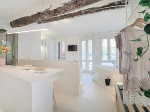 TV o dispositivi per l'intrattenimento presso Dreamers Sea View