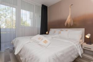 Postel nebo postele na pokoji v ubytování Balinn rooms
