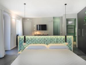 Letto o letti in una camera di Dreamers Sea View