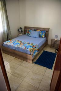 Ένα ή περισσότερα κρεβάτια σε δωμάτιο στο Casa Mama