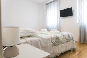 Postel nebo postele na pokoji v ubytování Apartment Zara - luxury apartment with private pool + 37 fotografií