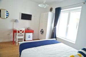 Katil atau katil-katil dalam bilik di Nautical rooms Old town